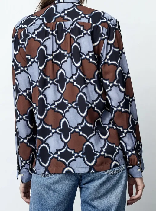 Phone photo of the blouse, back